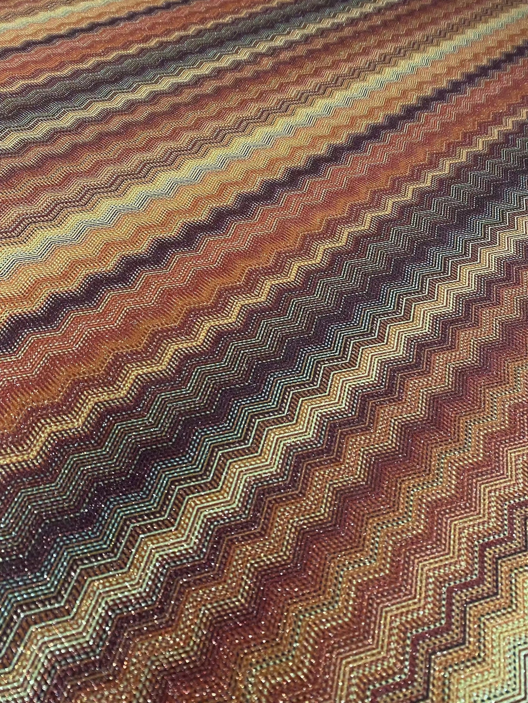 Zigzag knit fabric with Lurex shimmer in multi-color tones for versatile fashion and home decor projects