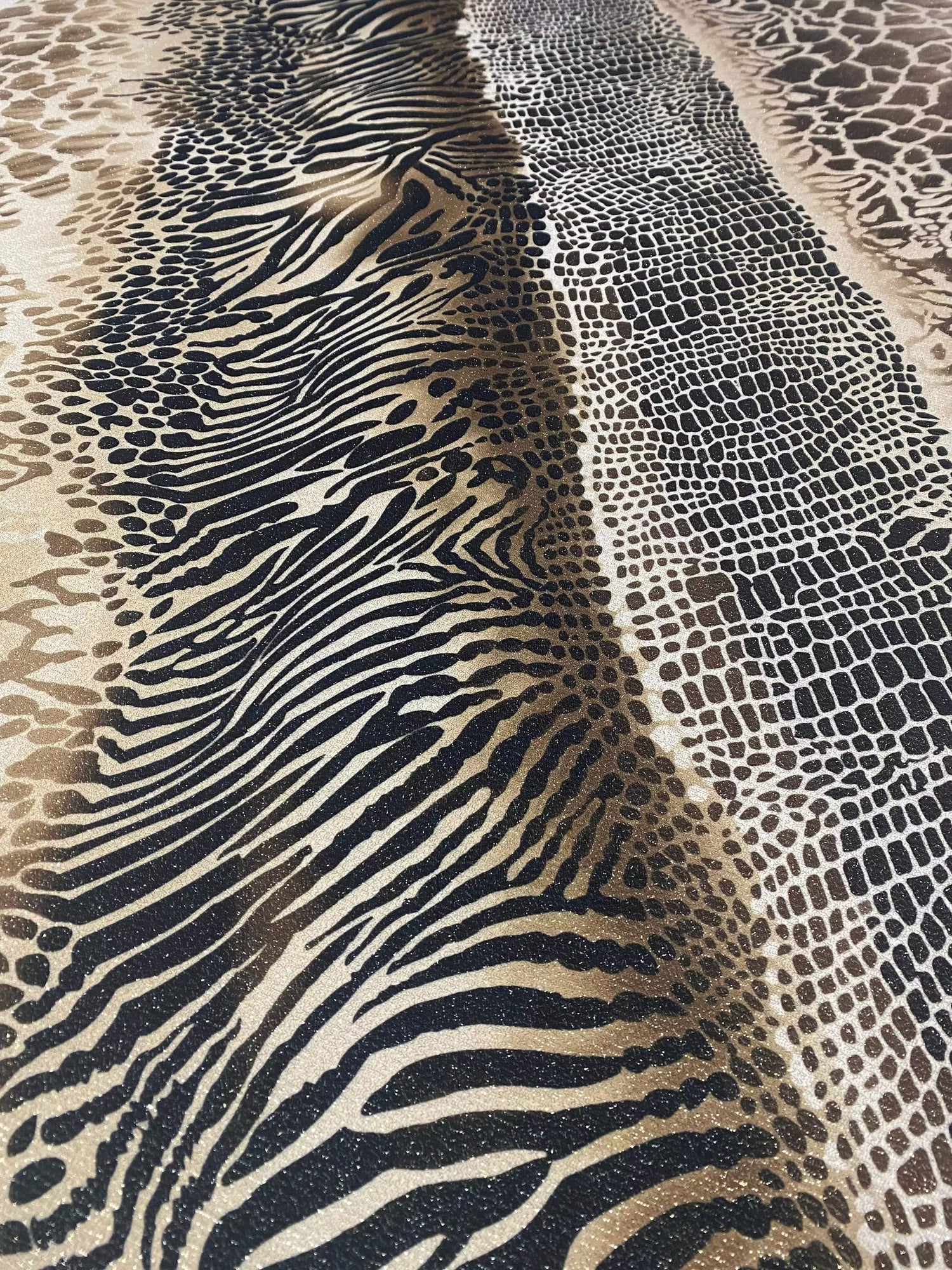 Metallic animal print Lurex fabric with gold shimmer and 4-way stretch spandex blend