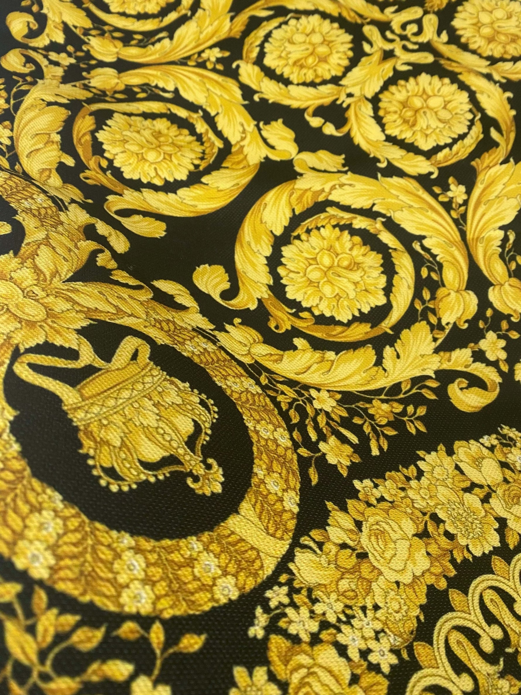 Barok Design Upholstery Fabric with elegant golden floral pattern on black polyester background for home décor