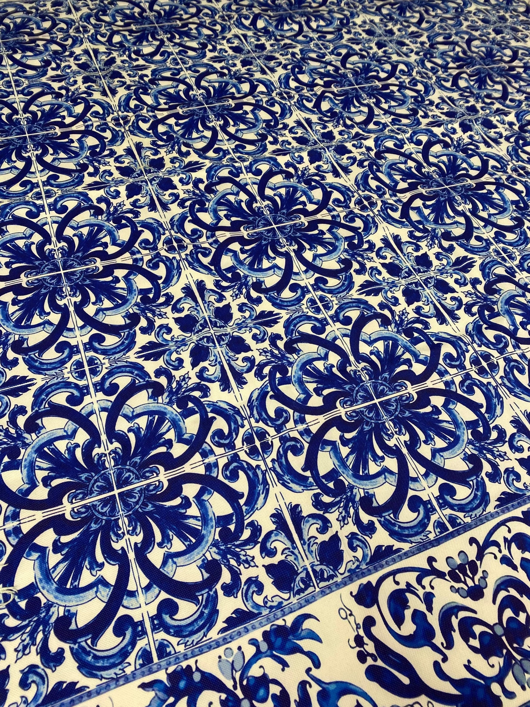 Blue and white floral patterned upholstery fabric with intricate Mavi design on polyester material