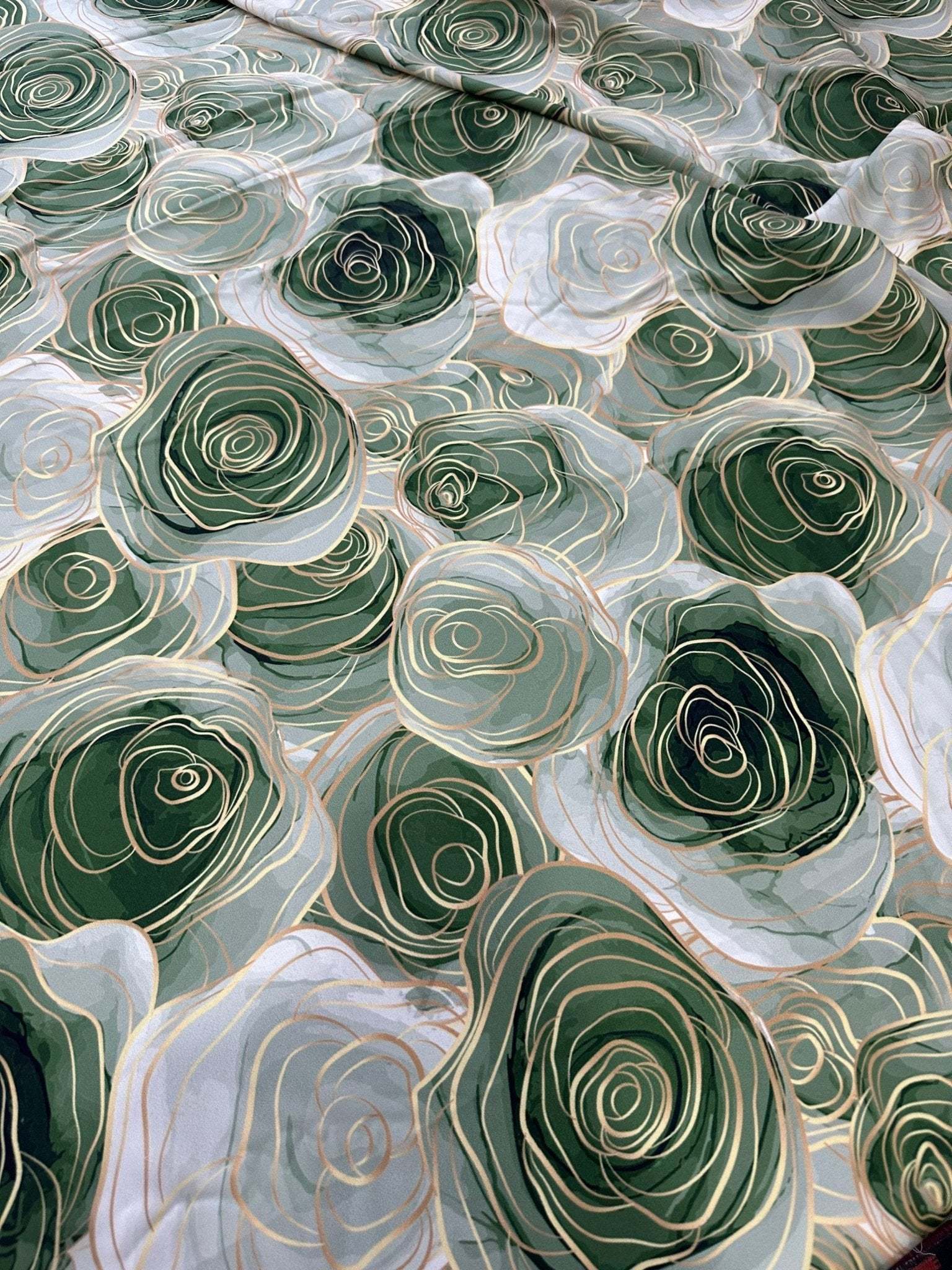 Abstract rose fabric with green and white swirl floral pattern, 150cm width textile suitable for sewing projects