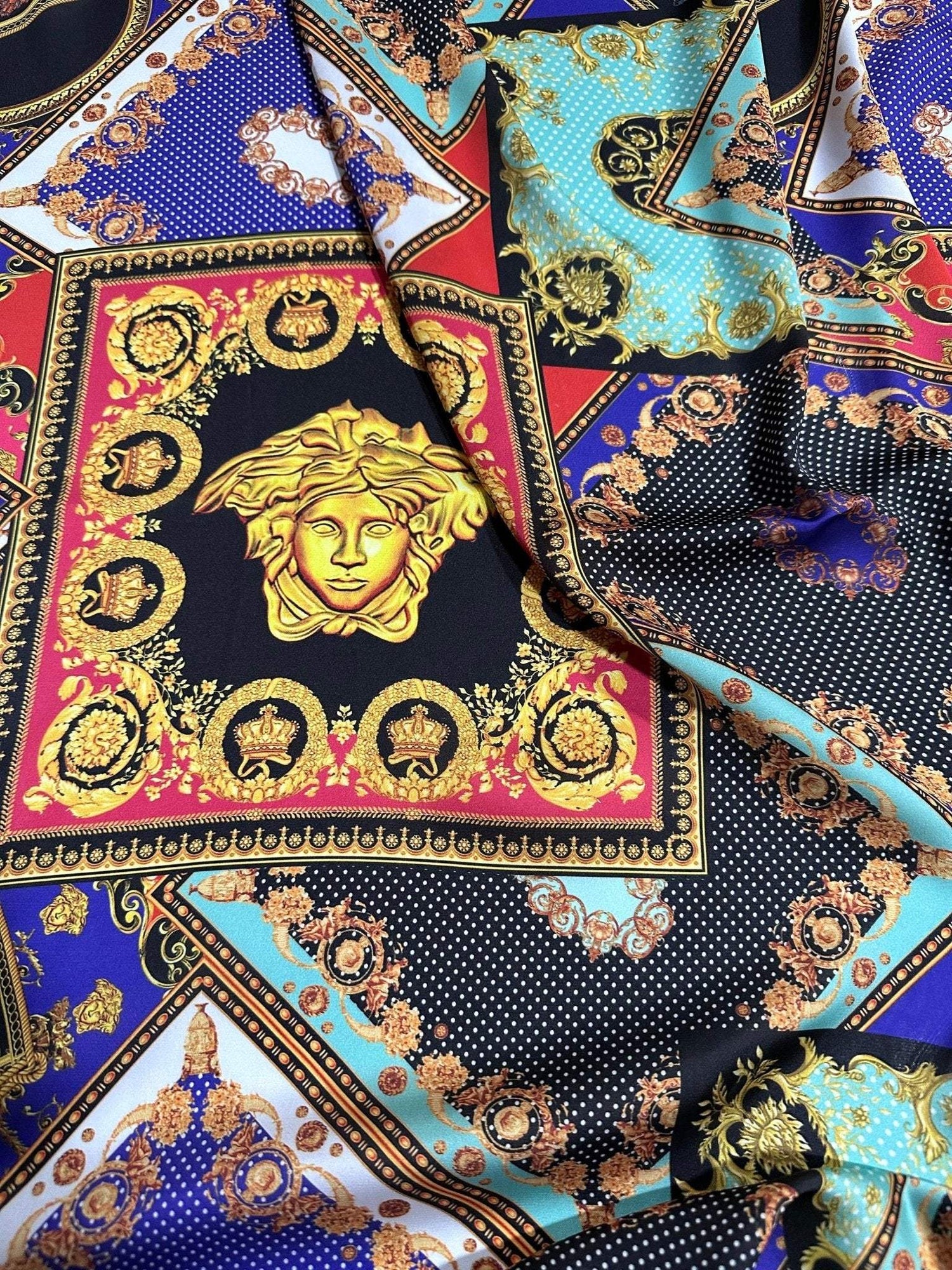 Baroque patchwork fabric with intricate gold medallion and colorful geometric patterns