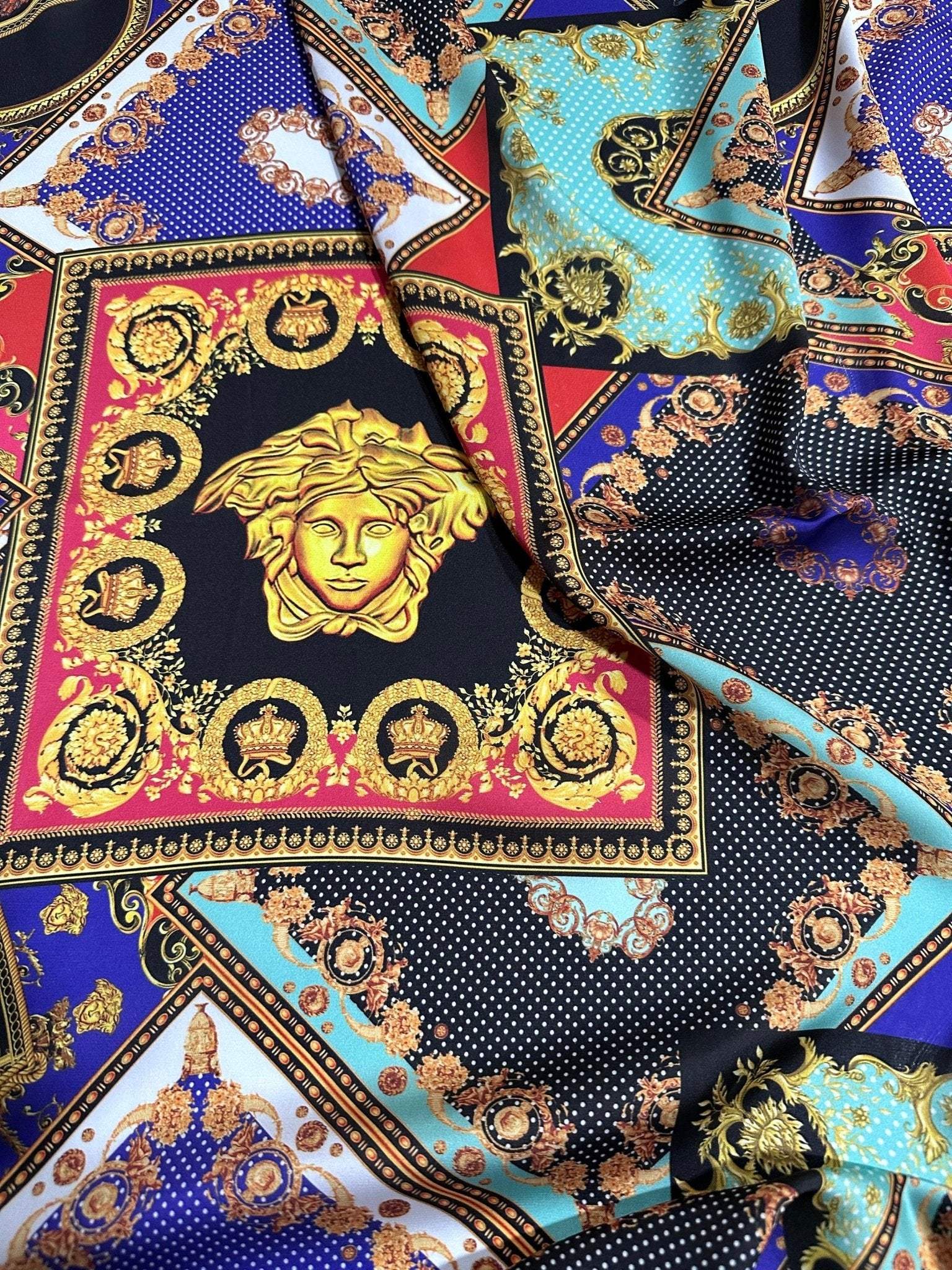 Baroque patchwork fabric with intricate gold medallion and colorful geometric patterns
