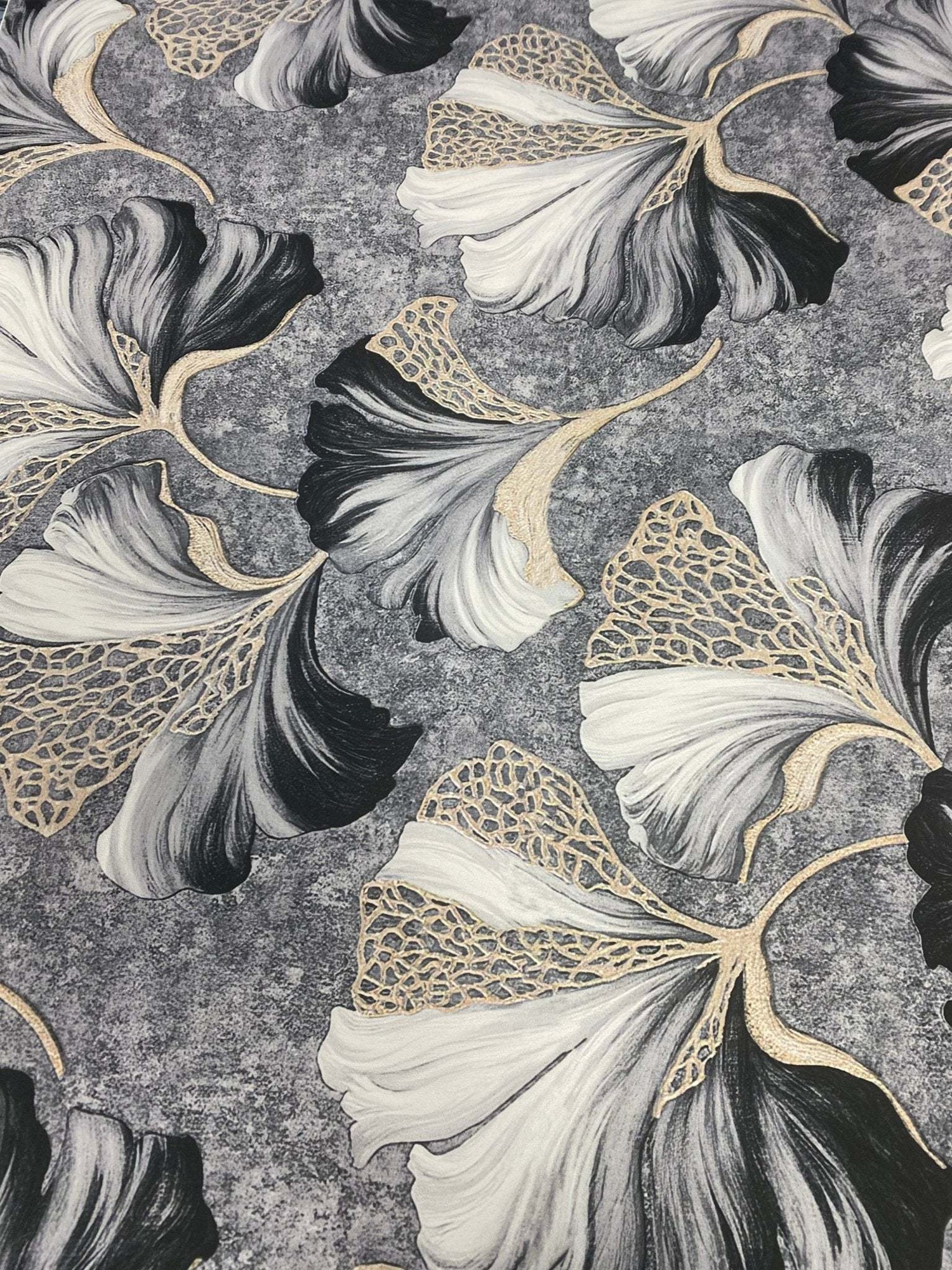 Black and white ginkgo leaf fabric with elegant gold vein botanical print on textured background