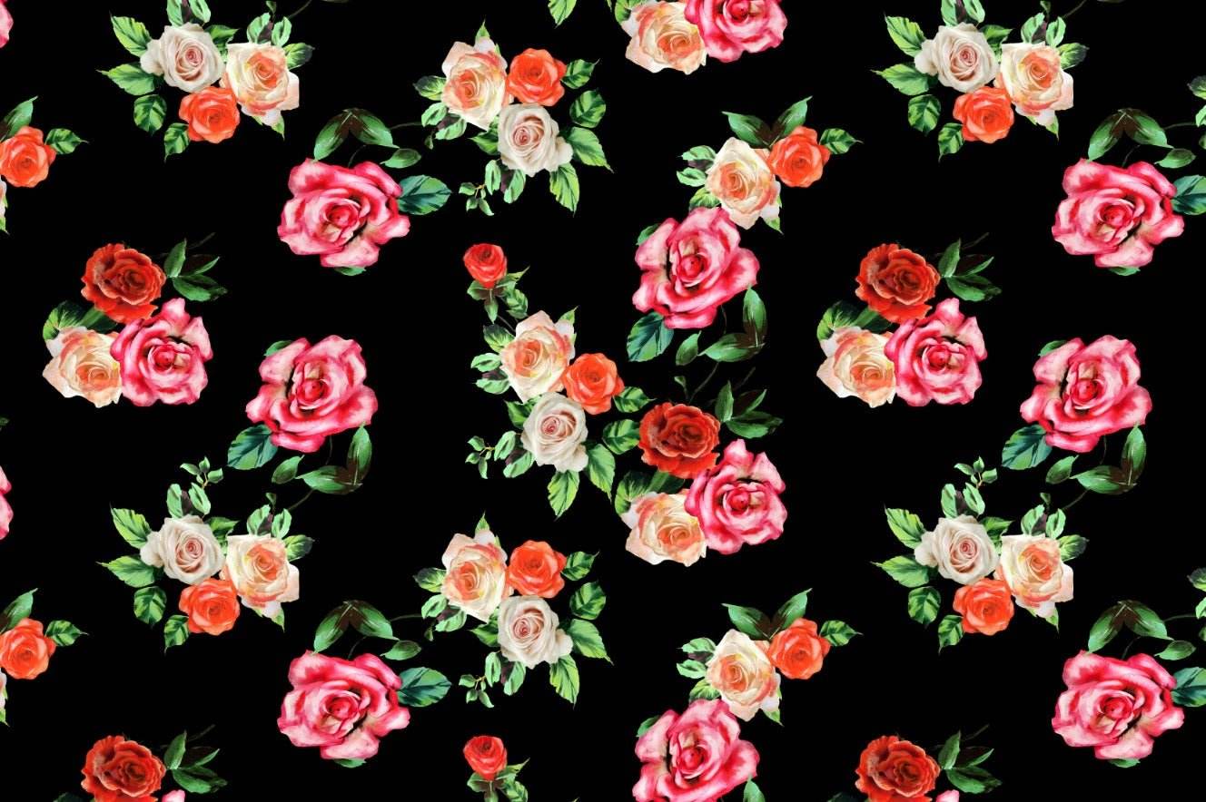 Black fabric with vibrant rose pattern in pink, red, and white flowers with green leaves digital print