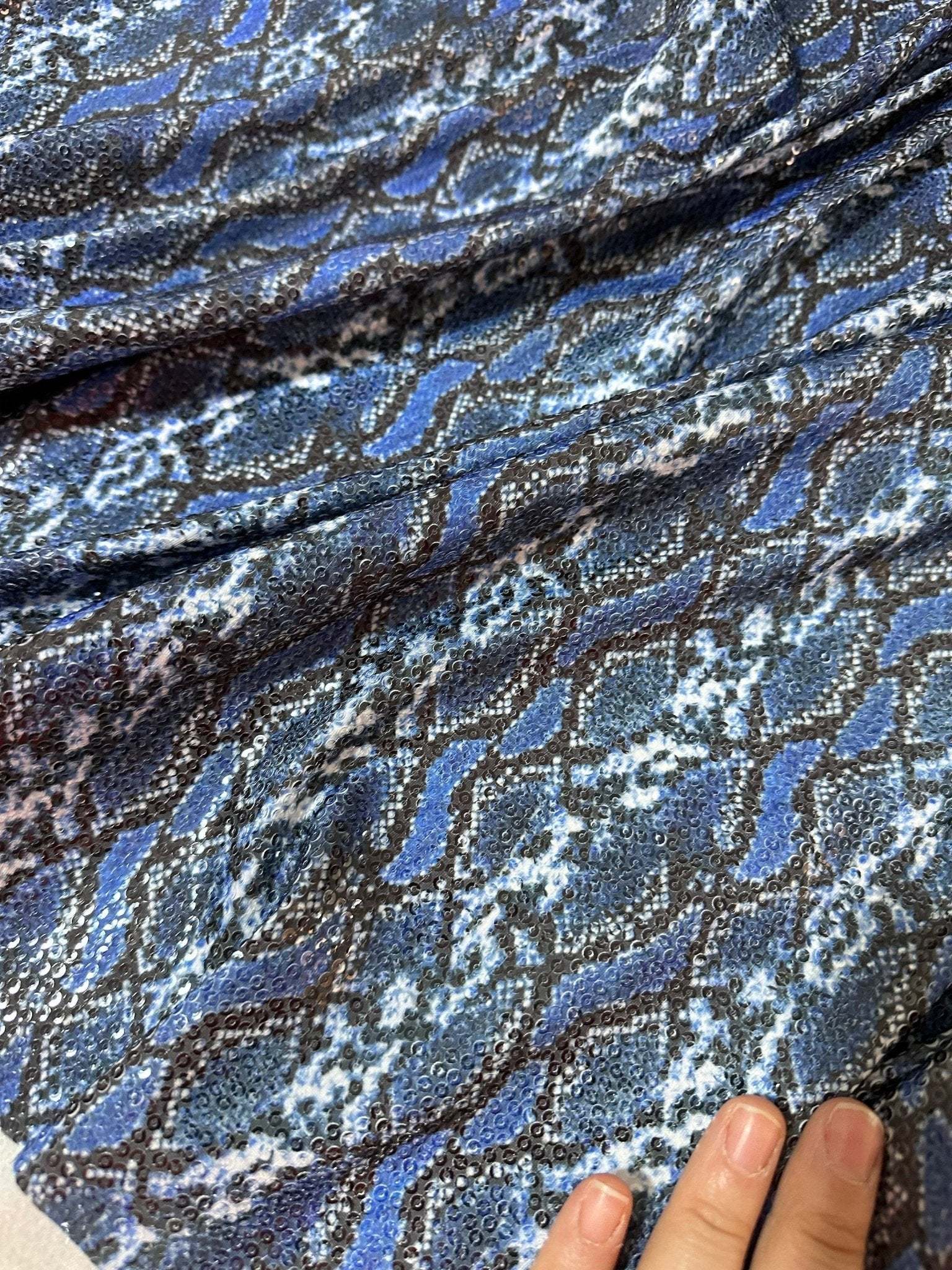 Blue exotic animal print fabric with sequins and two-way stretch texture