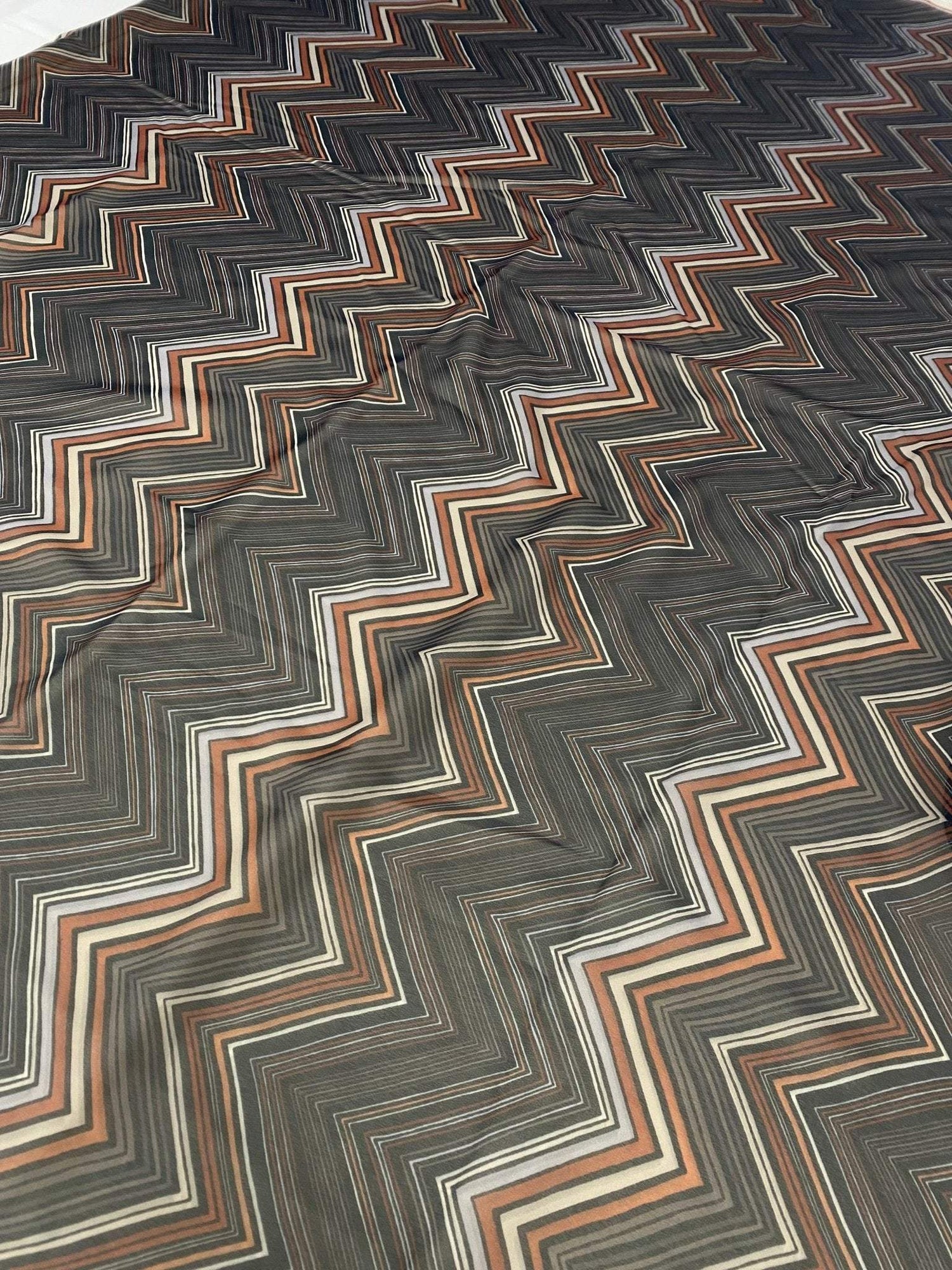 Brown and beige chevron zigzag pattern fabric with earthy tones and 150cm width for home decor and sewing projects