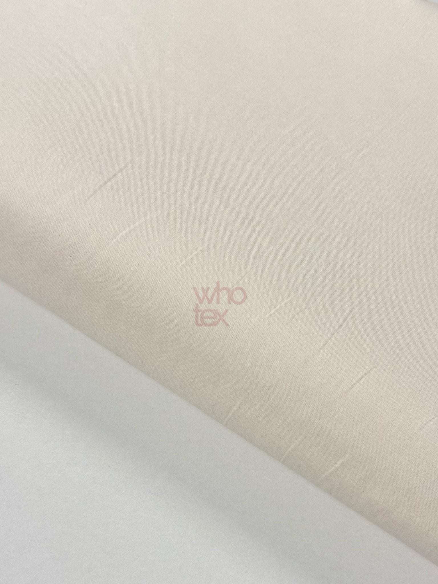 Cream ecru poplin fabric made of 100% cotton with 240 cm width, ideal for bedding and clothing.