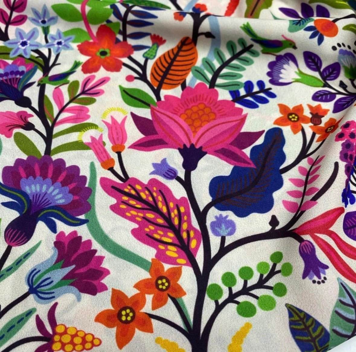 Bright Mexican Flowers Fabric with colorful floral crepe pattern on white background