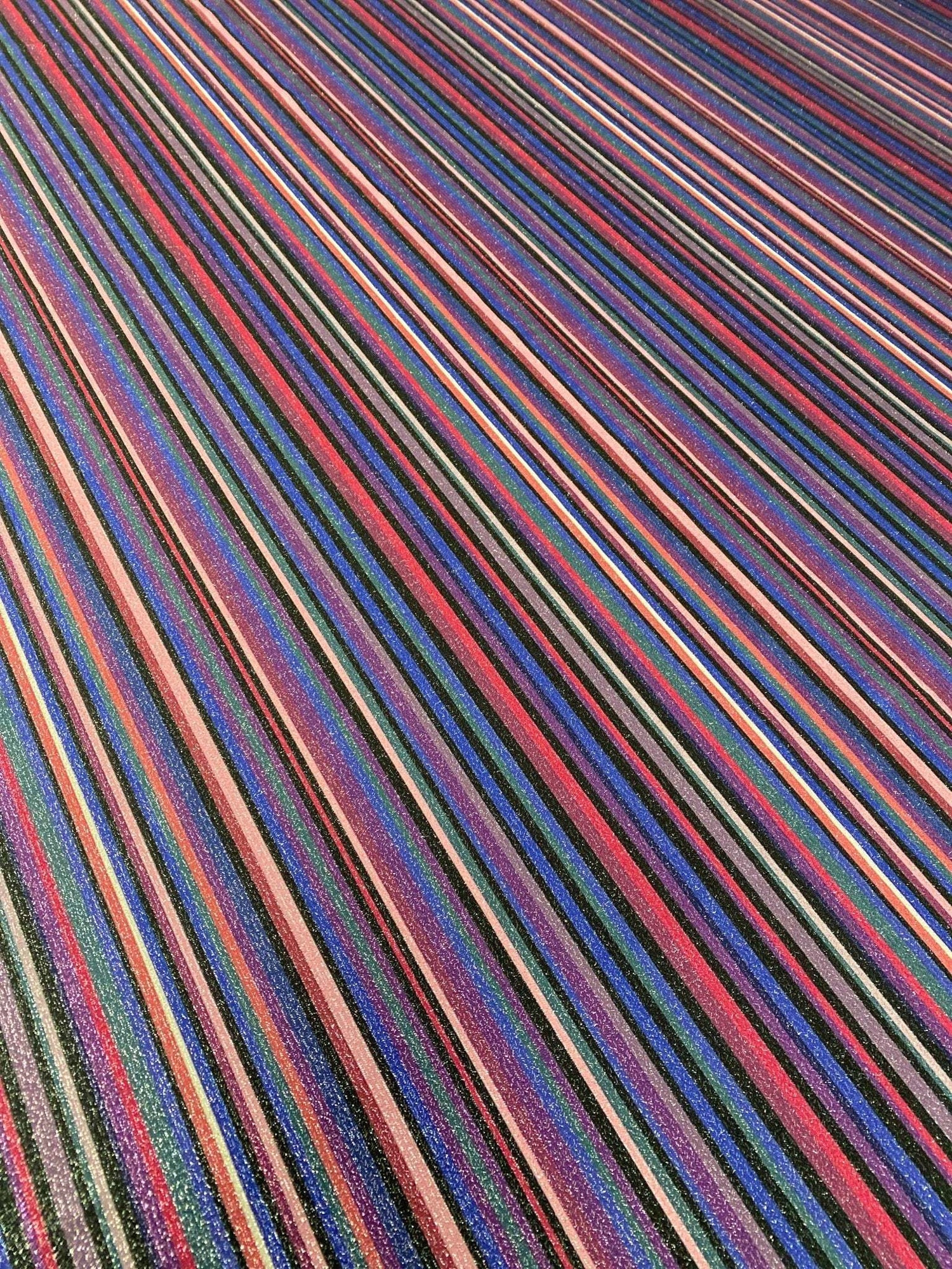 Glitter Striped Lurex Spandex fabric with vibrant multi-colored stripes and shimmering finish suitable for stretchy dressmaking and costumes