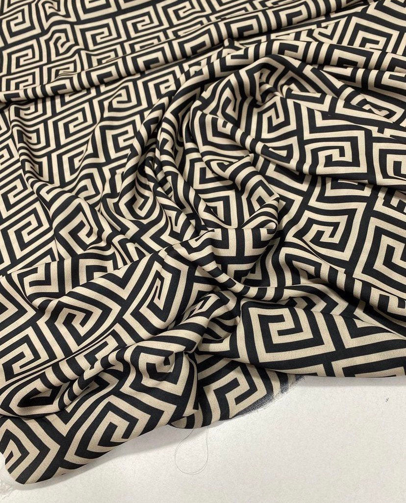 Tela con diseño de clave griega: material artesanal para tapicería en blanco y negro