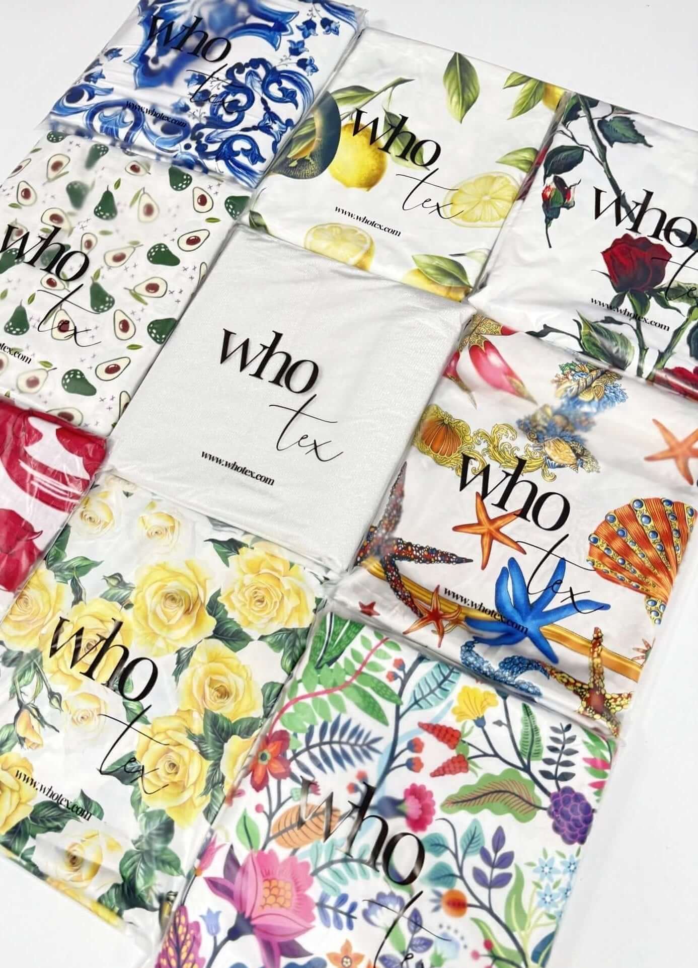 Collection of colorful notebooks with floral and nature-themed designs on a white background.