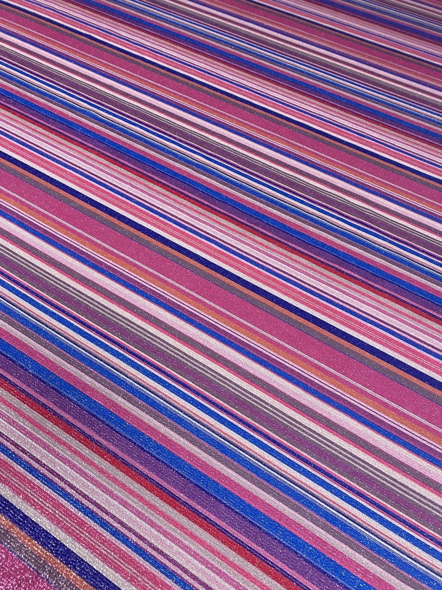 Lurex striped glitter fabric with multicolor horizontal stripes and shimmering texture