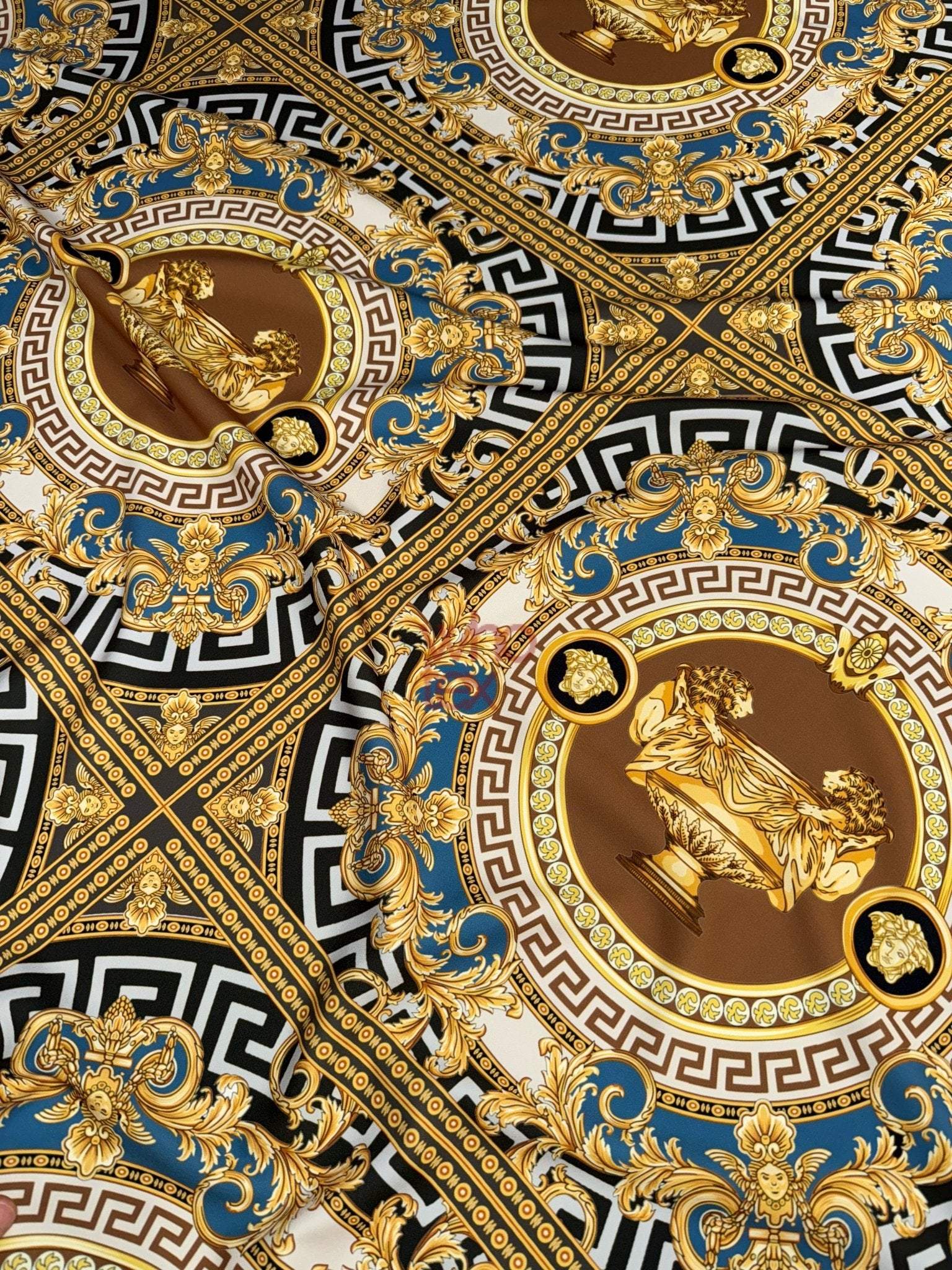 luxurious gold and blue ornate Baroque pattern fabric with intricate classical motifs and detailed design