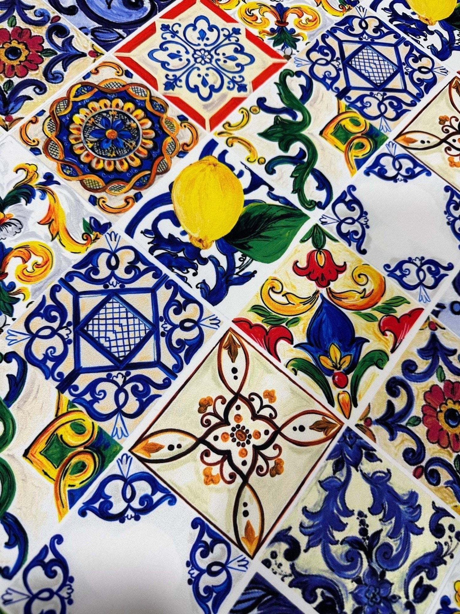 Colorful Majolica pattern fabric with intricate tile-inspired designs and lemon motifs, perfect for upholstery and curtains