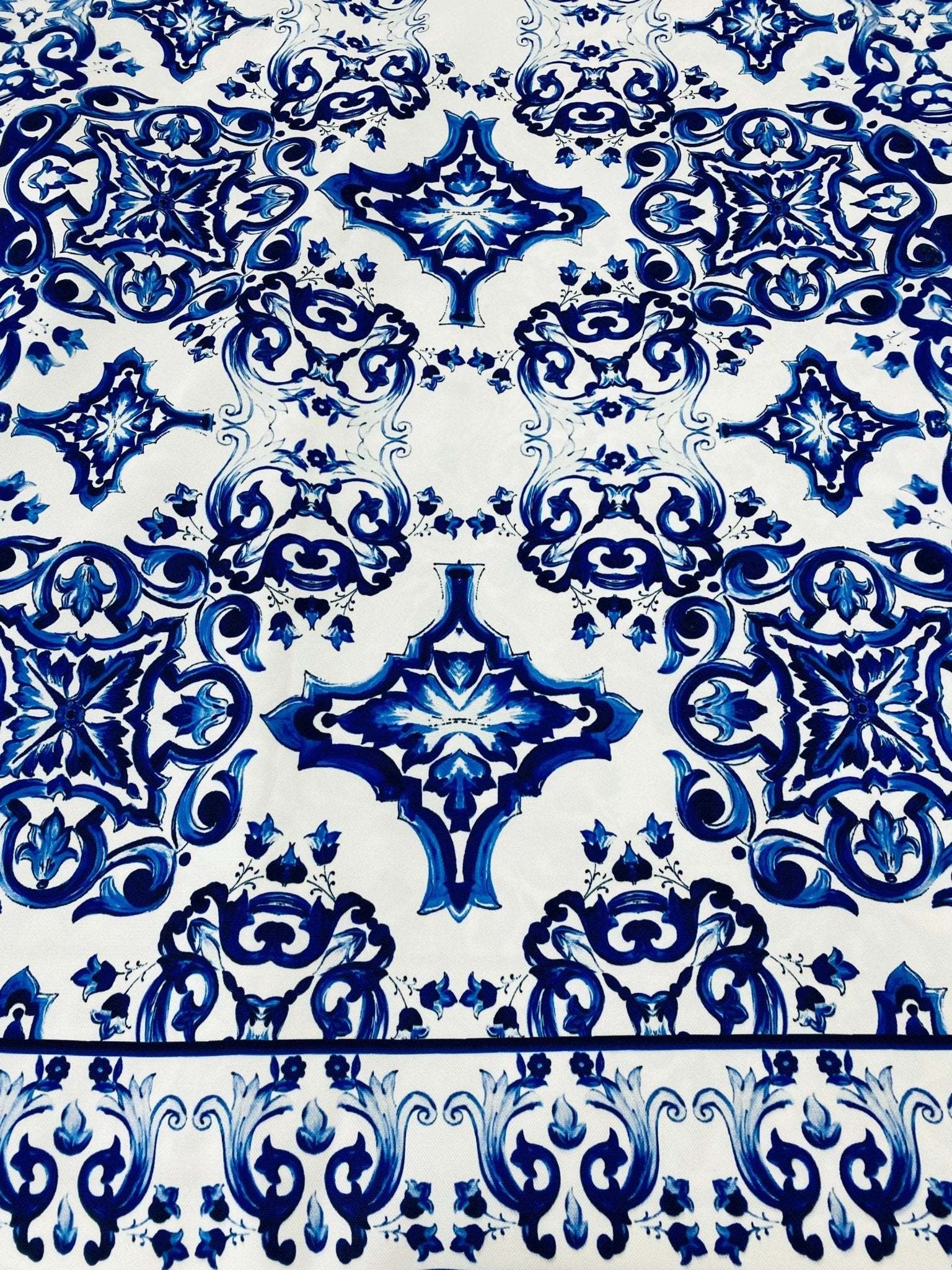 Blue and white Majolica pattern outdoor fabric with intricate detailed design, weather-resistant upholstery material
