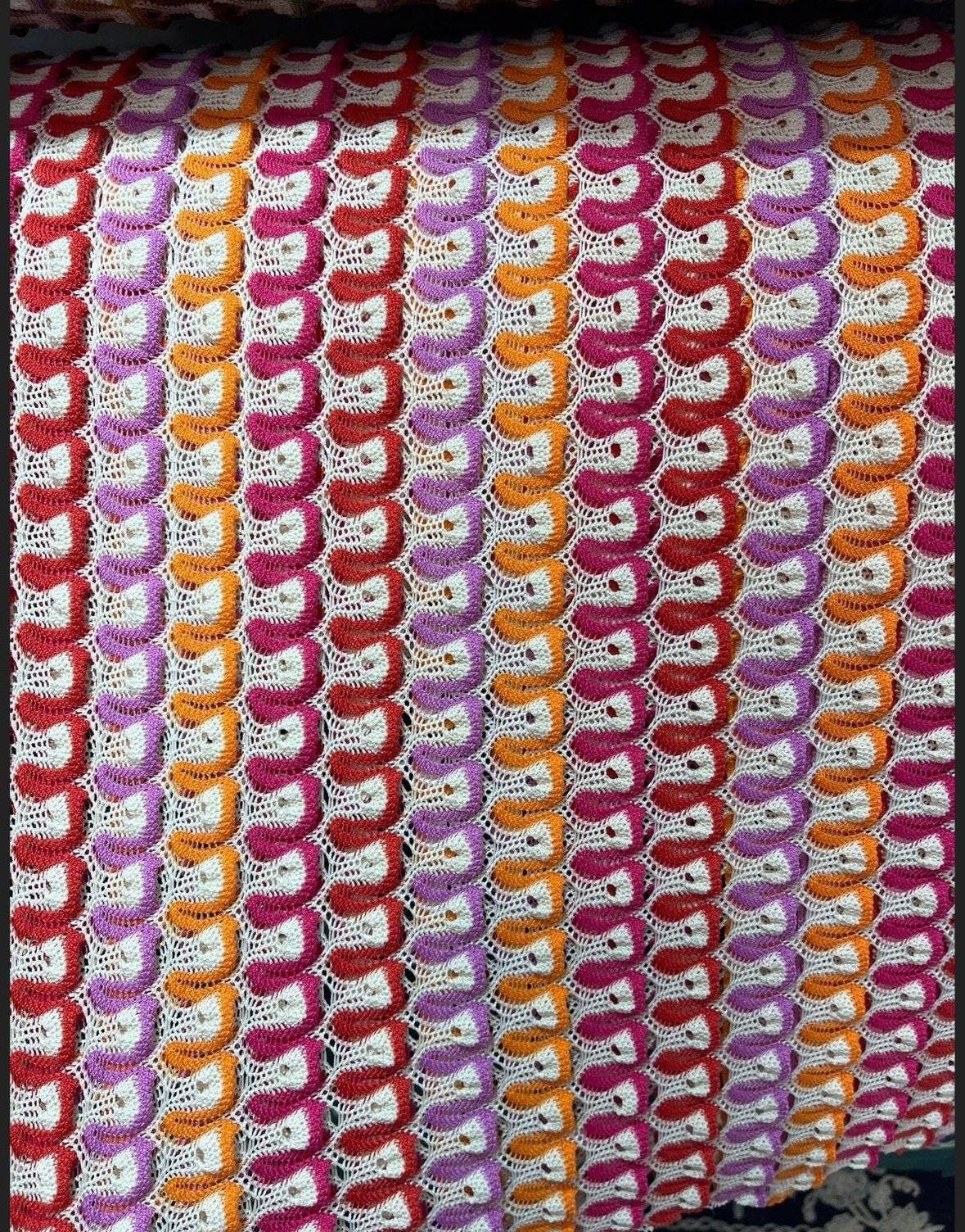 Luxury zigzag knit jersey mesh fabric with colorful striped pattern for elegant apparel design