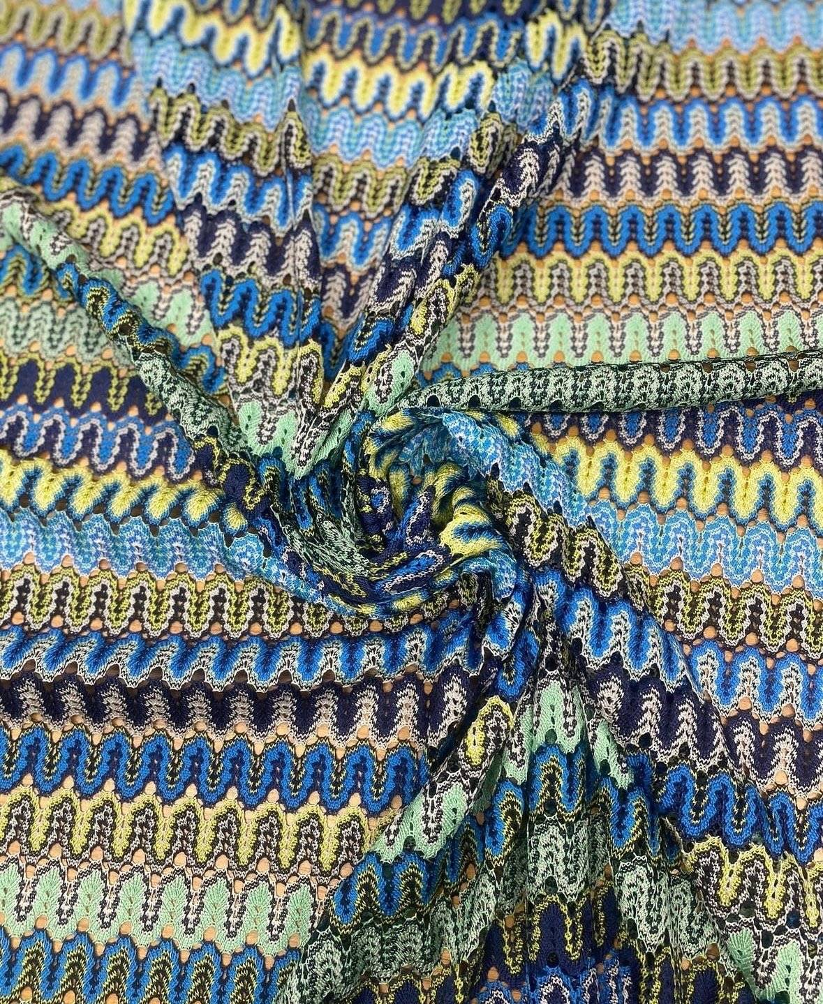 Yellow and blue zigzag pattern mesh fabric for crafting and fashion projects
