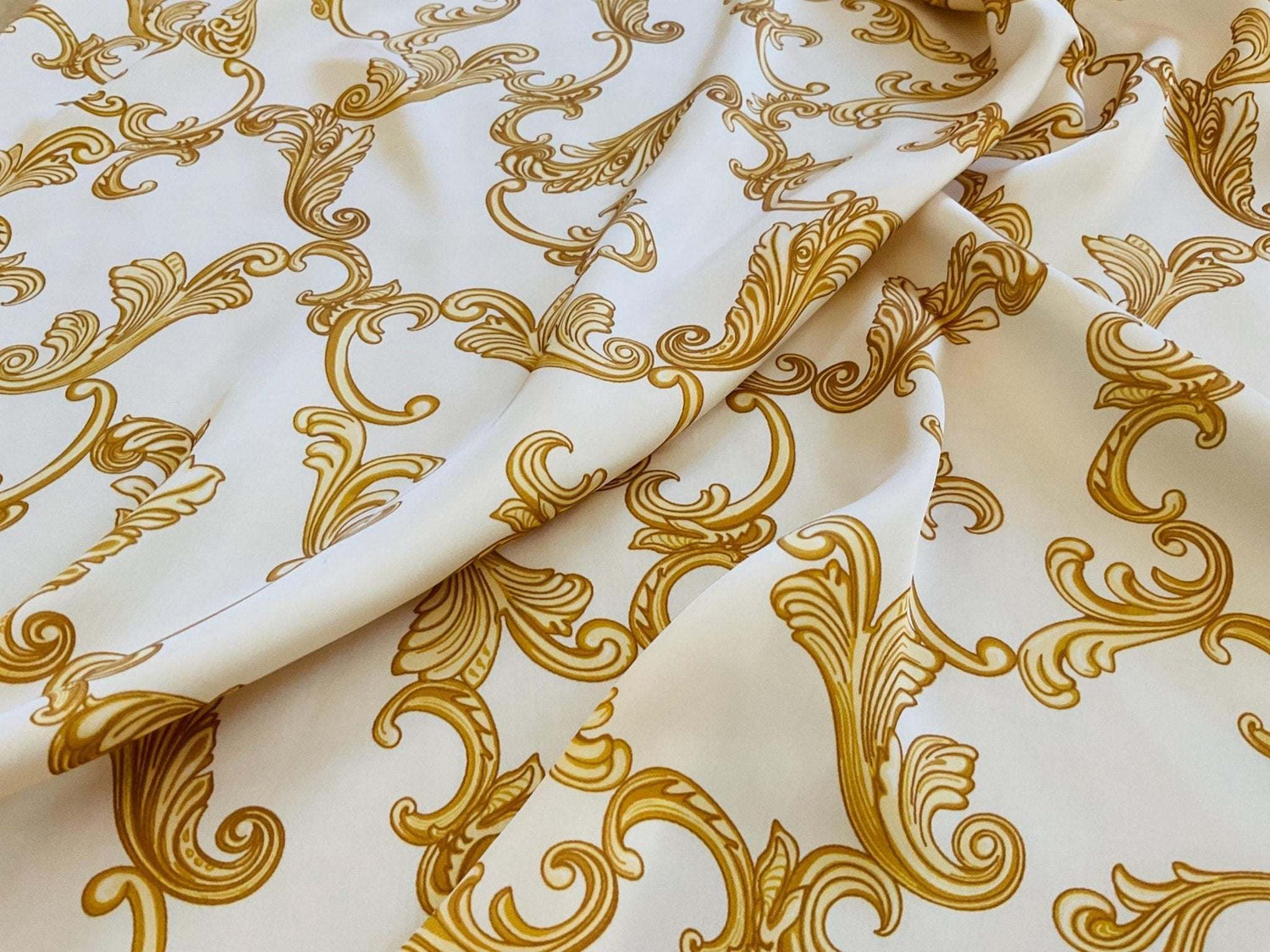 high-quality Baroque pattern dresswear fabric in navy blue with elegant gold ornate design
