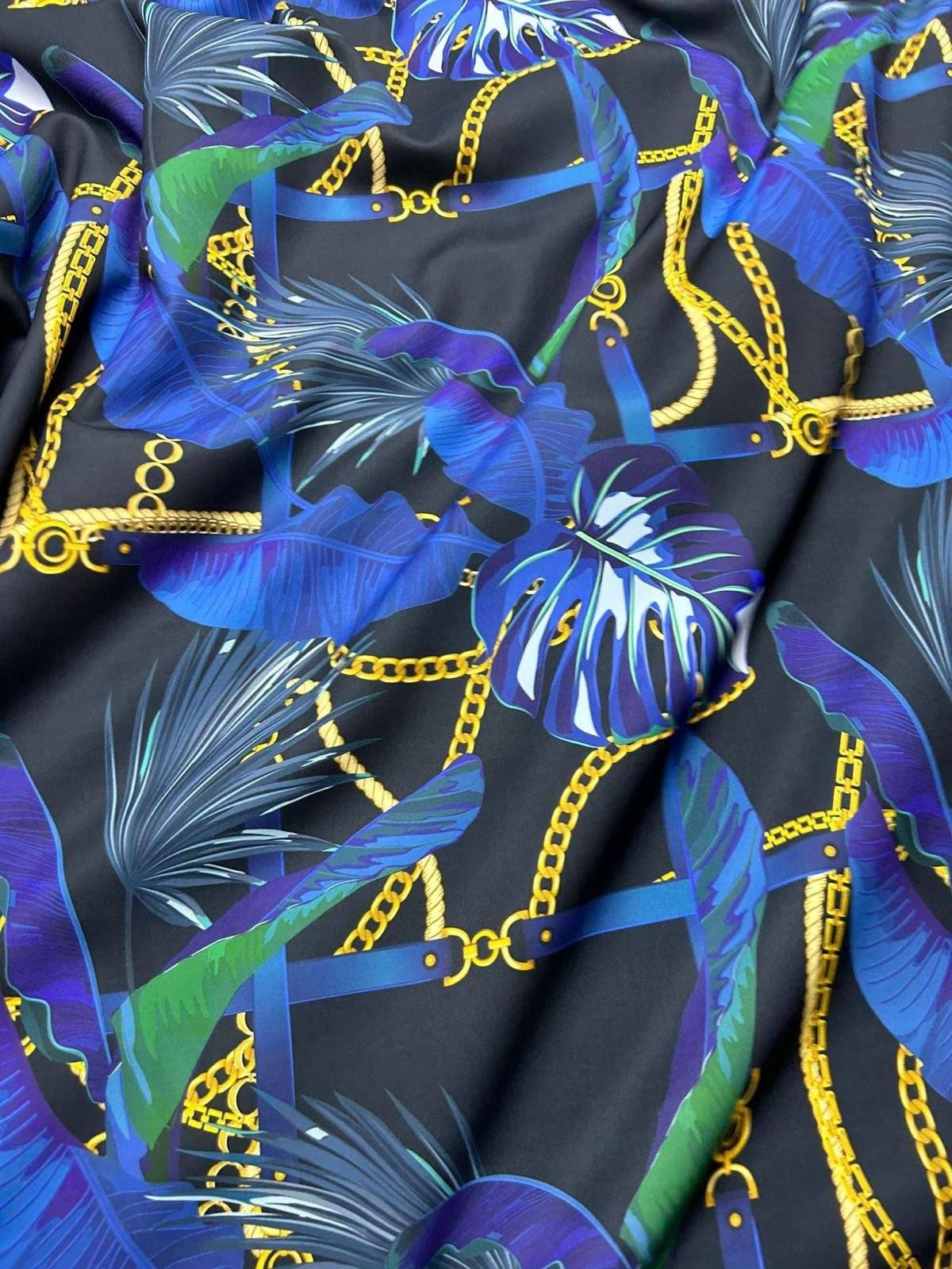 Navy blue fabric with leaf chain pattern and gold chain accents