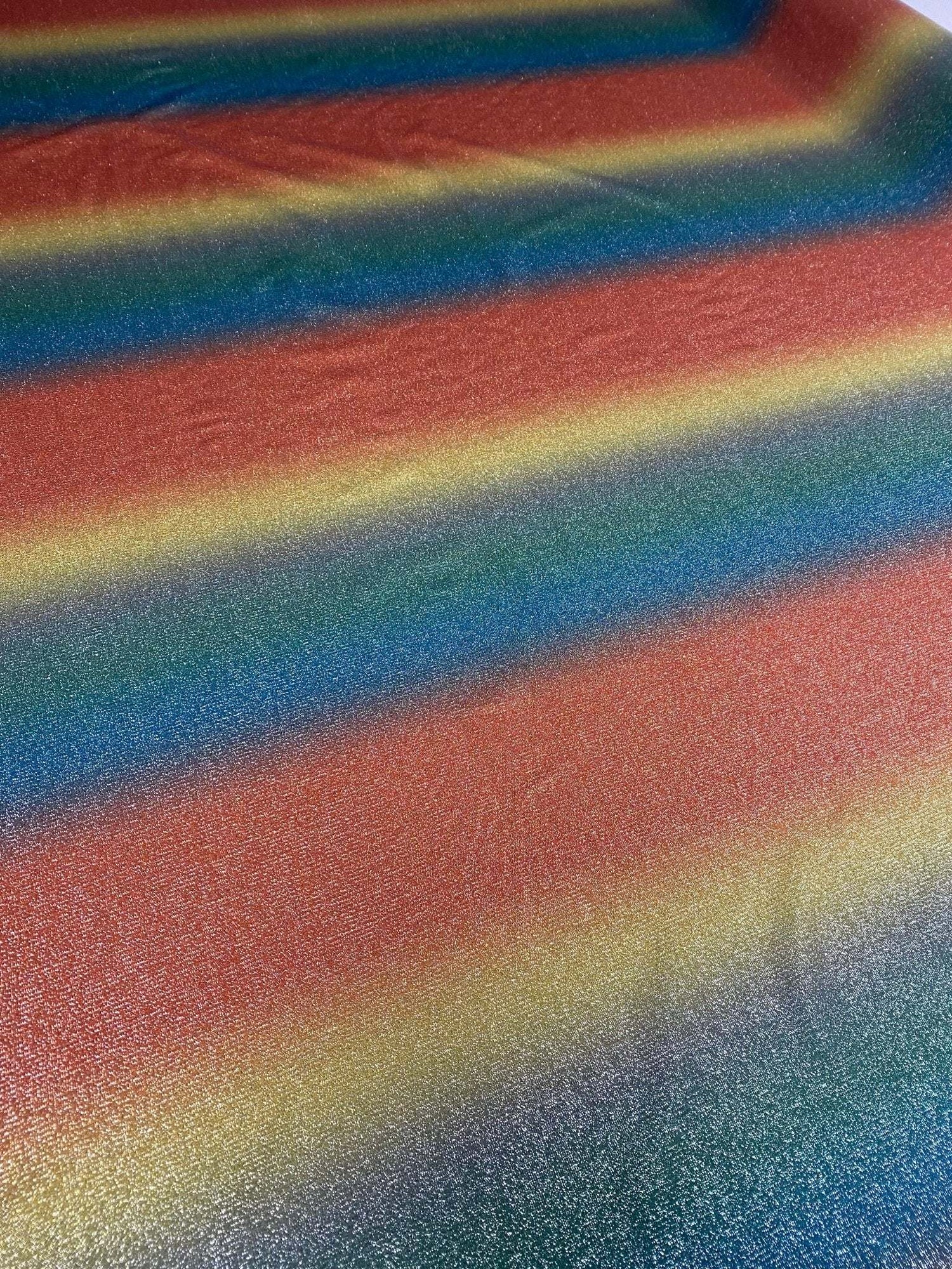 Rainbow ombre glitter fabric with multicolor shimmering striped Lurex design and 4-way stretch polyester blend