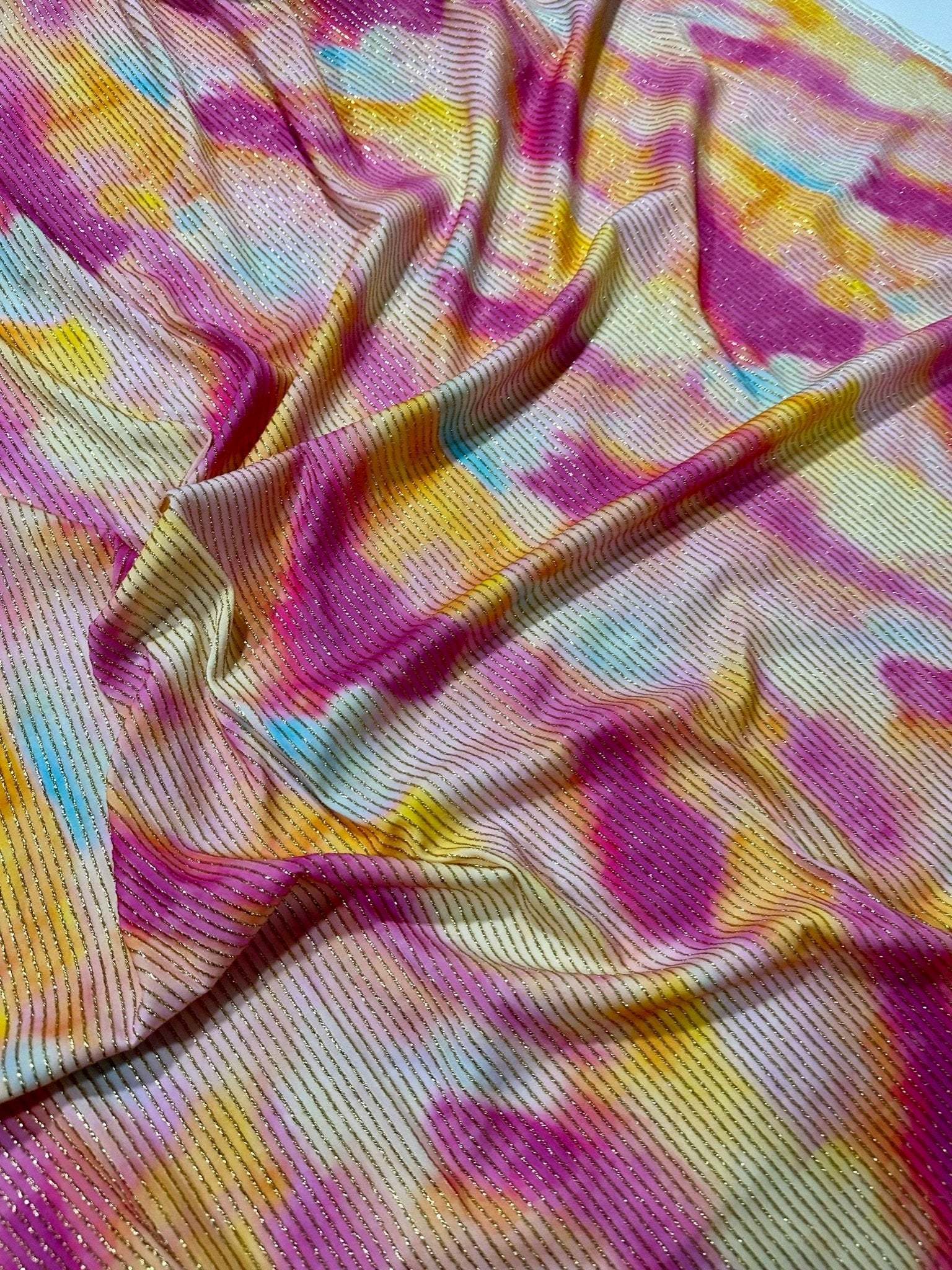 Shimmer tie dye Ottoman fabric with soft 4-way stretch and subtle shimmer in vibrant pink, yellow, and blue tones