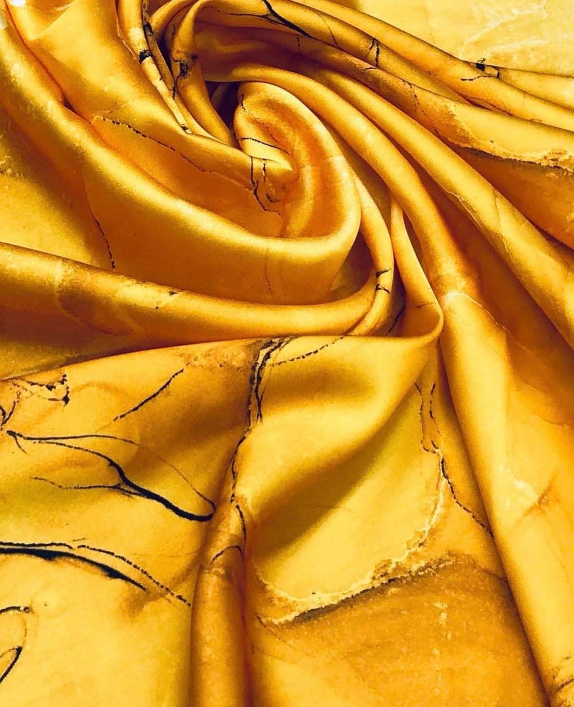 Yellow tie dye fabric with soft texture and unique pattern for sewing and crafts