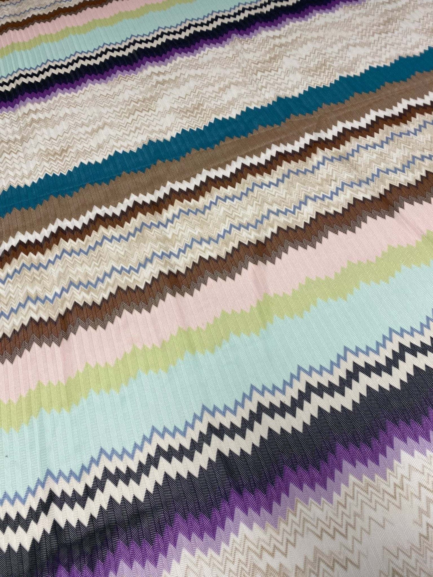 Colorful zigzag mesh fabric with woven textured pattern for crafting and upholstery projects