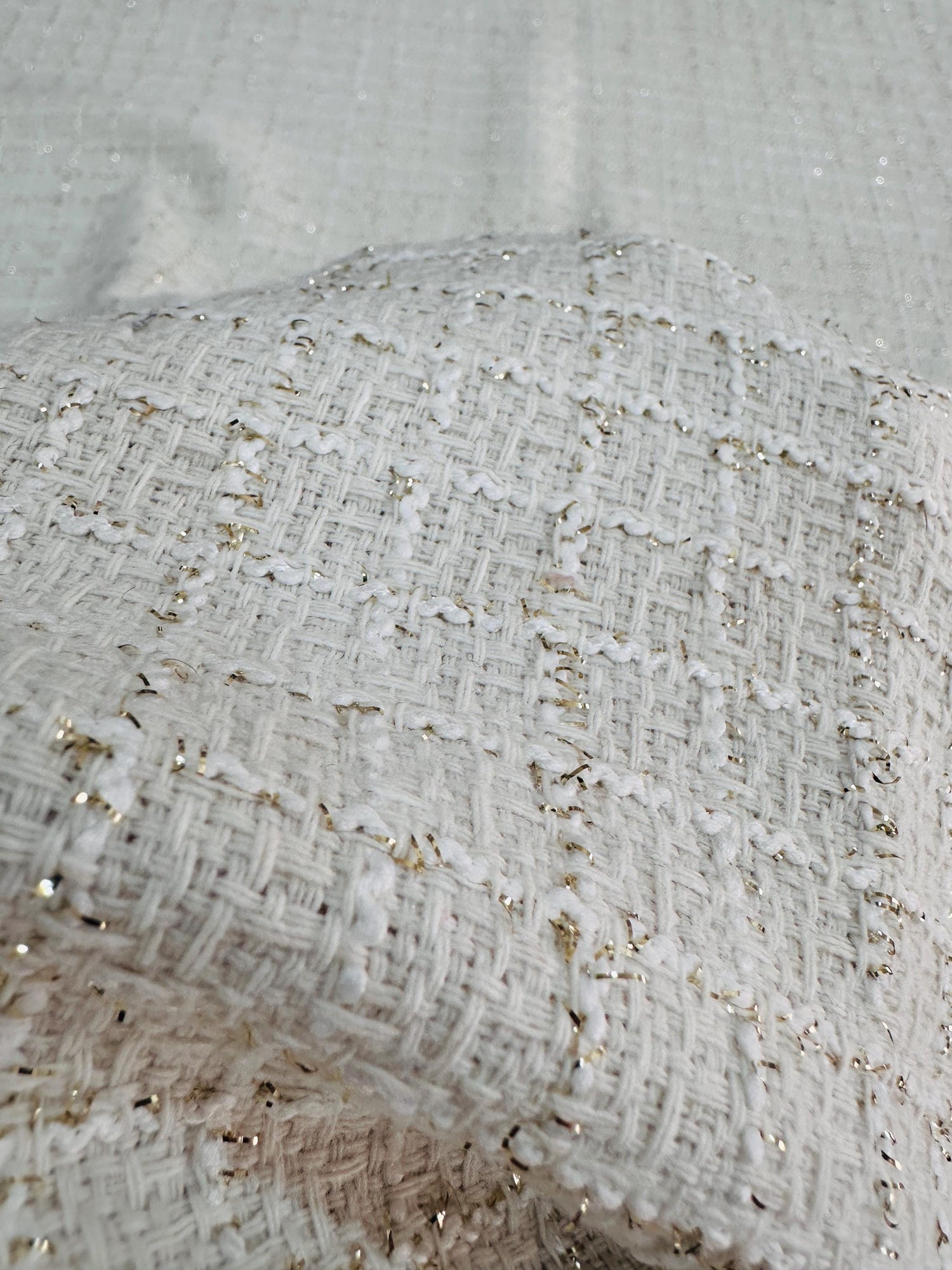 Weißer glitzernder Tweedstoff