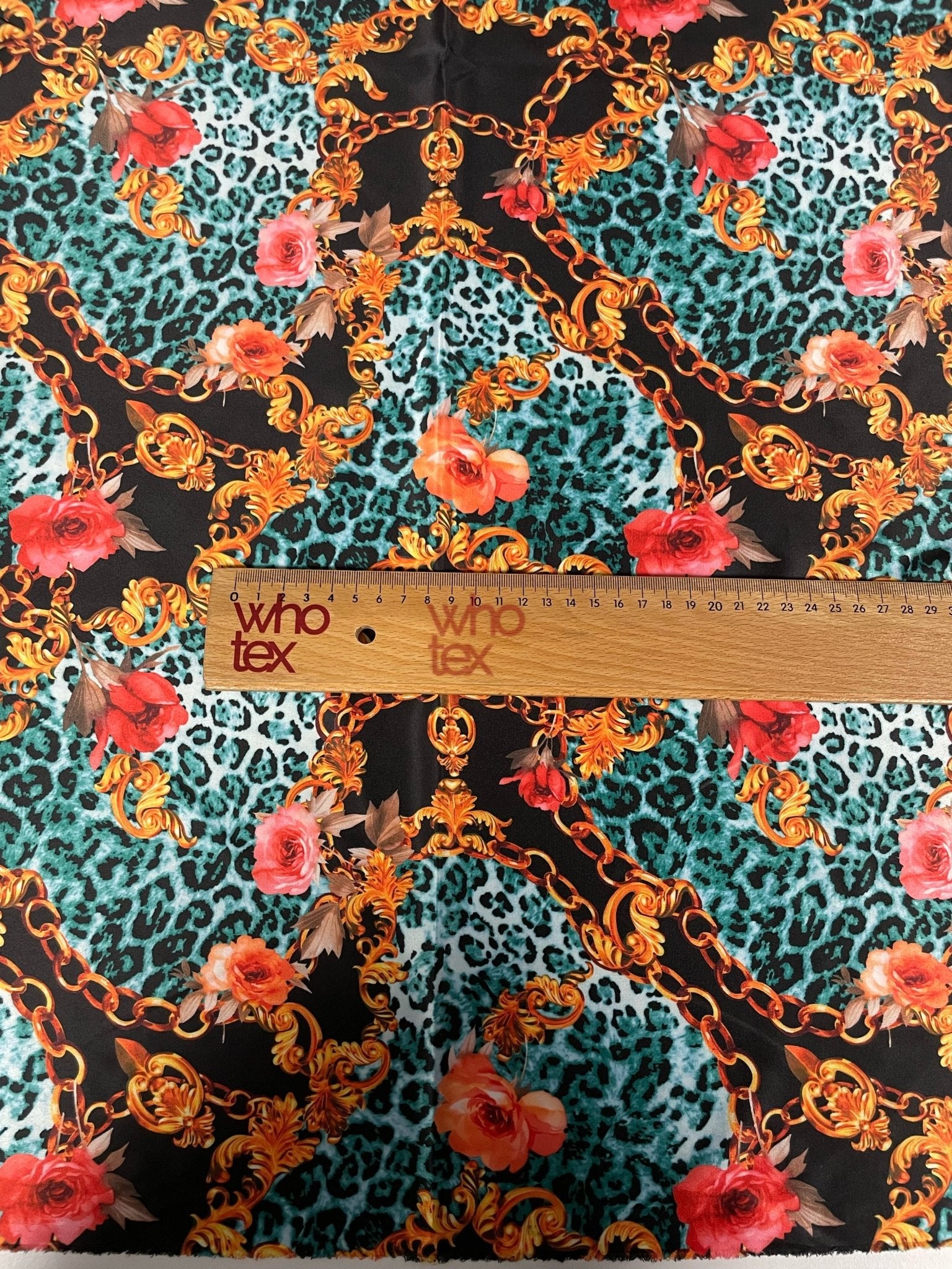 Leopard Print Fabric with Gold Chains and Floral Accents – Bold & Exotic Design - Whotex Online Fabric Store