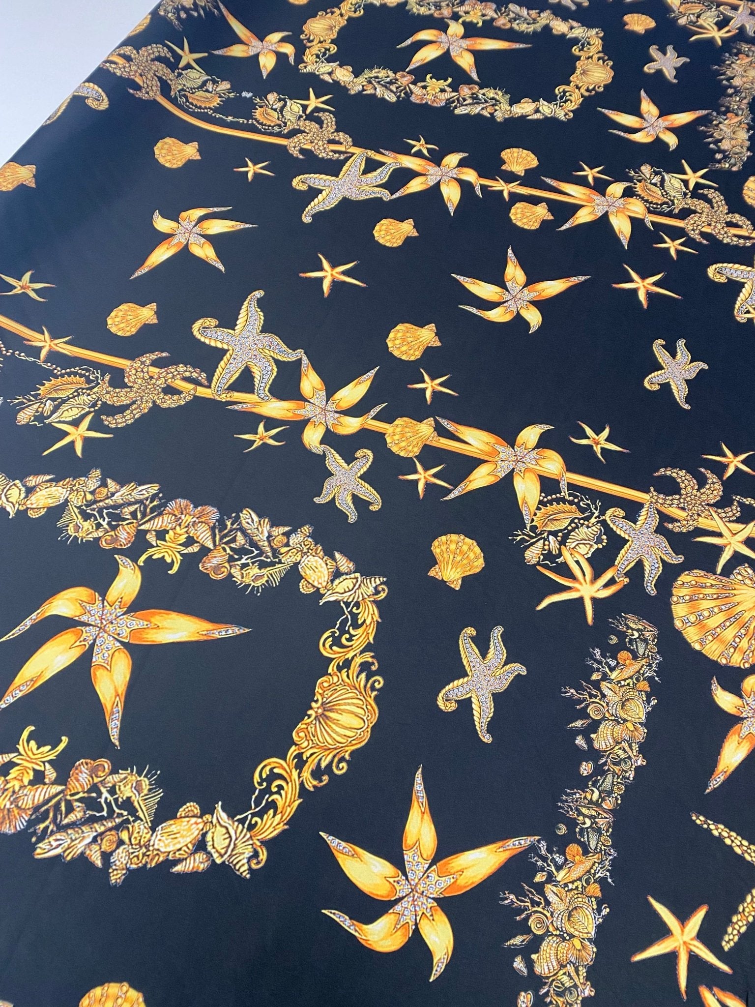 Navy Chiffon Satin Fabric with Starfish & Seashell Print - Whotex Fabrics London